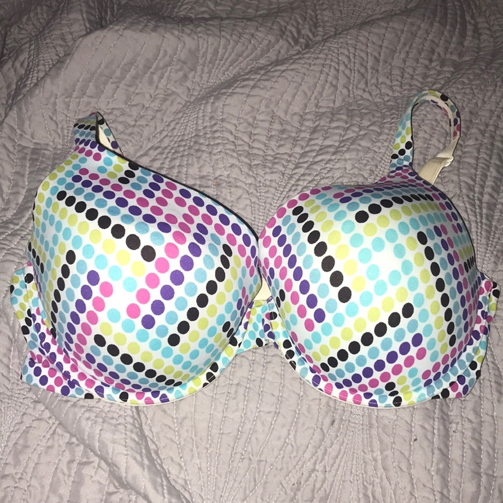 Victoria secret full coverage uplift size 36 DD bra that has Polka dots on it.